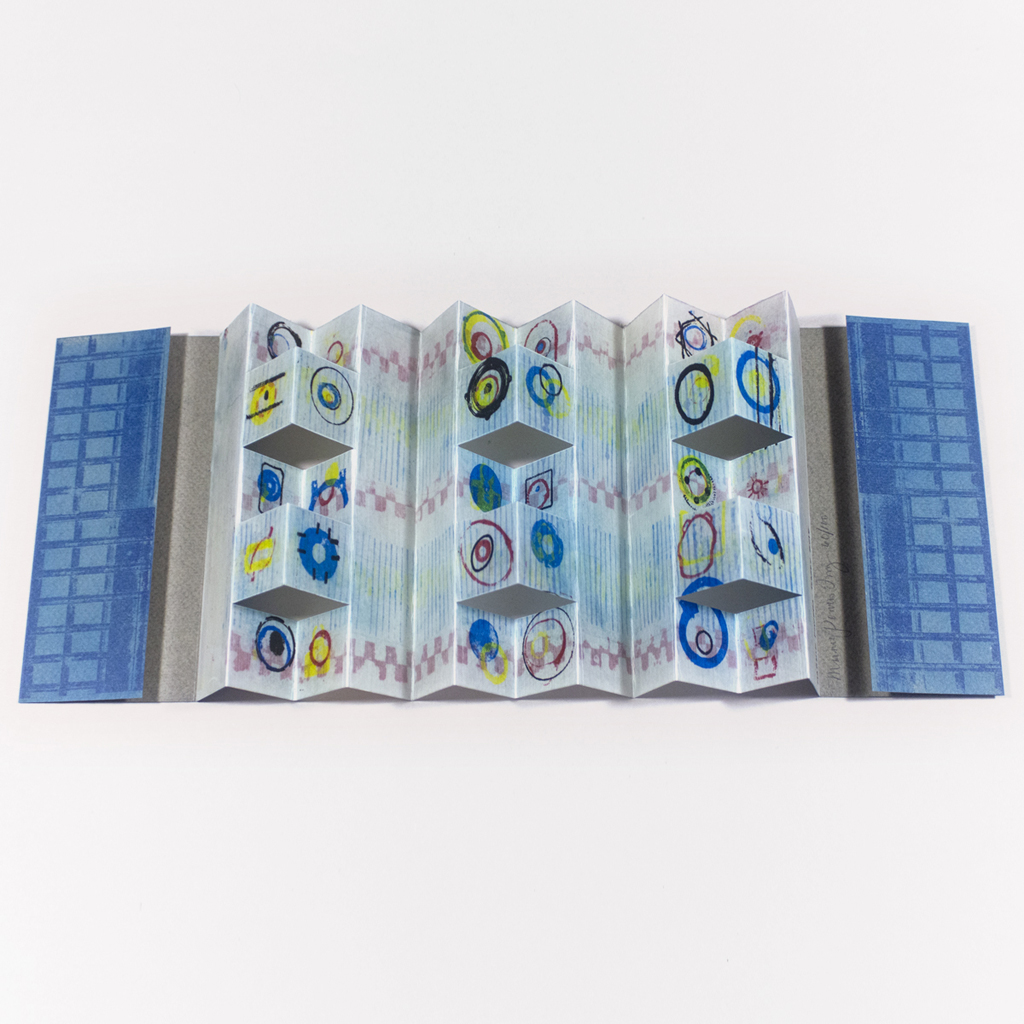 "Everything Has a Language" open with folds, front