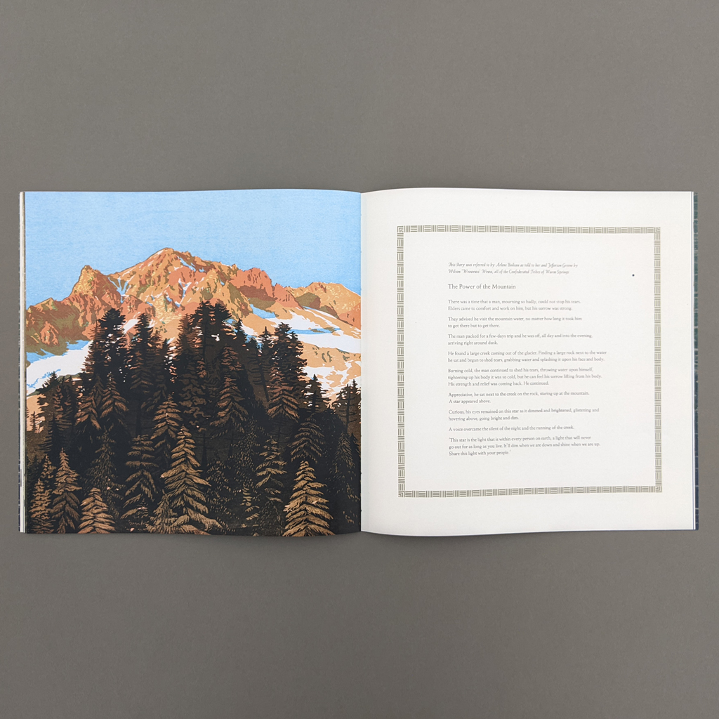 Owed to The Mountain, inside spread. Verso: Color print of the peak of Mount hood, echoed by a pyramidal cluster of pine trees. Recto: A creation myth about the mountain is typeset inside a square border.
