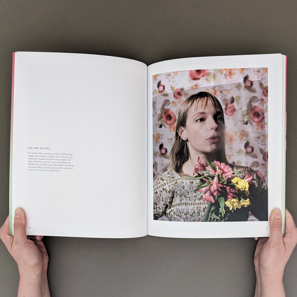 Stock Pile, pp. 40-41. Recto shows a photo of a woman (the artist) with a bouquet behind a plastic screen or shield. Verso has text on a white background; the headline reads "online dating."
