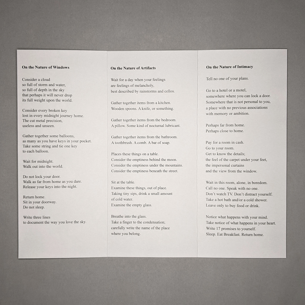 Pamphlet no. 10, “Items of Inconsequential Dysfunction & Beauty,” fully open to display “On the Nature of Windows” (left), “On the Nature of Artifacts” (center), and “On the Nature of Intimacy” (right)
