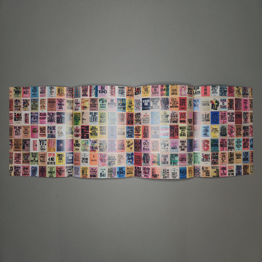 Pages 74–75 of "Citizen Printer" are a double gate-fold with hundreds of Kennedy's posters displayed in a grid.