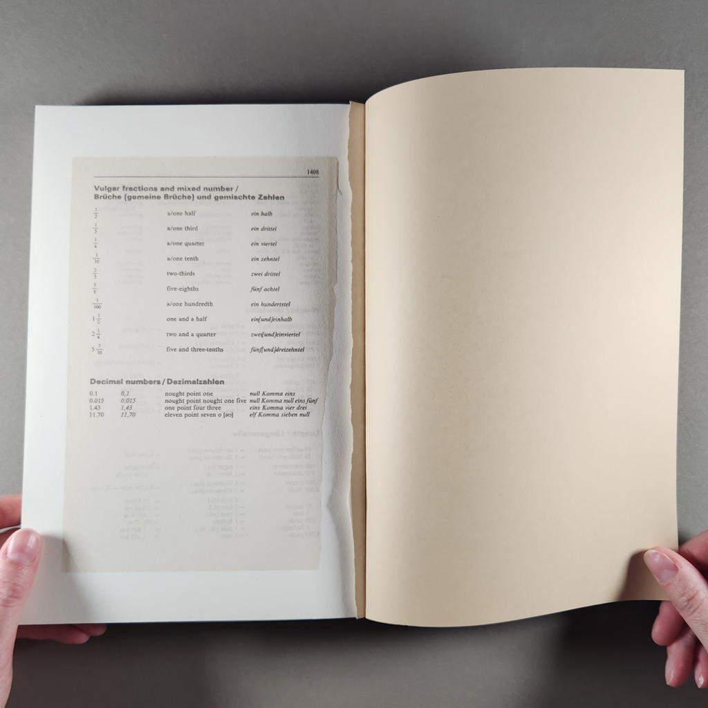 Last Pages, open to its final page, which is torn out. A ragged edge is left visible in the gutter.