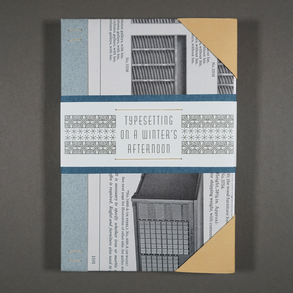 Front cover of Typesetting on a Winter's Afternoon: ornamented title text on a paper band over found papers.