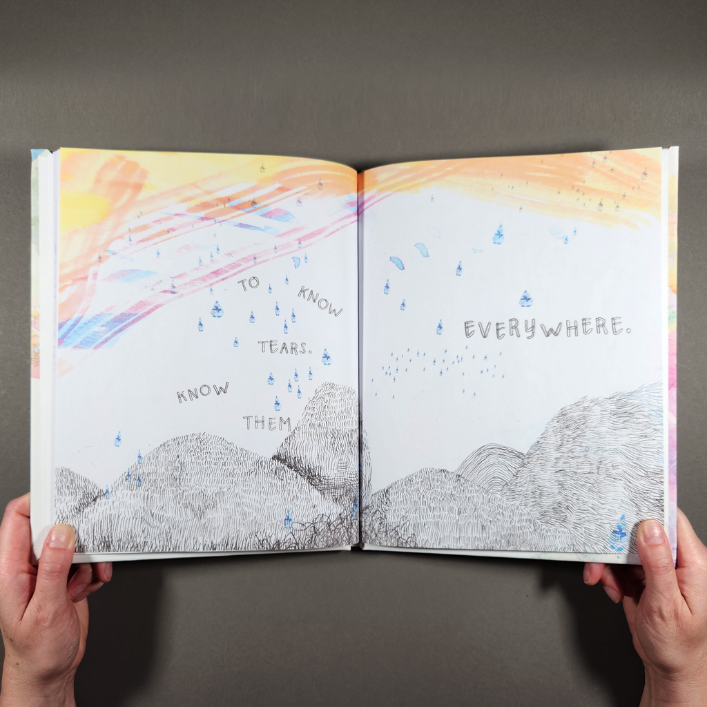 Tears Are Everywhere, inside spread: teardrops falling from a watercolor sky onto line-work hills with hand-lettered text in between.